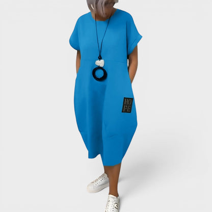 Nicole | Robe midi fluide à poches