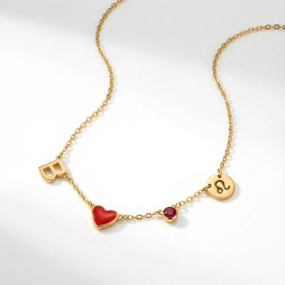 COLLIER AVEC INITIALE EN FORME DE CŒUR